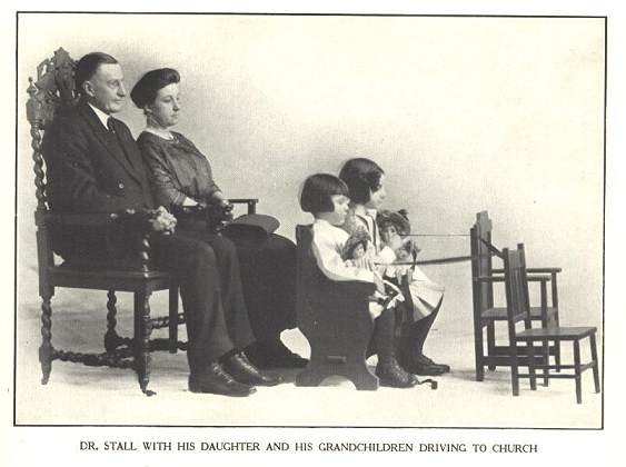 Dr. Stall with his daughter and grandchildren driving to church [seated in chairs in playroom]